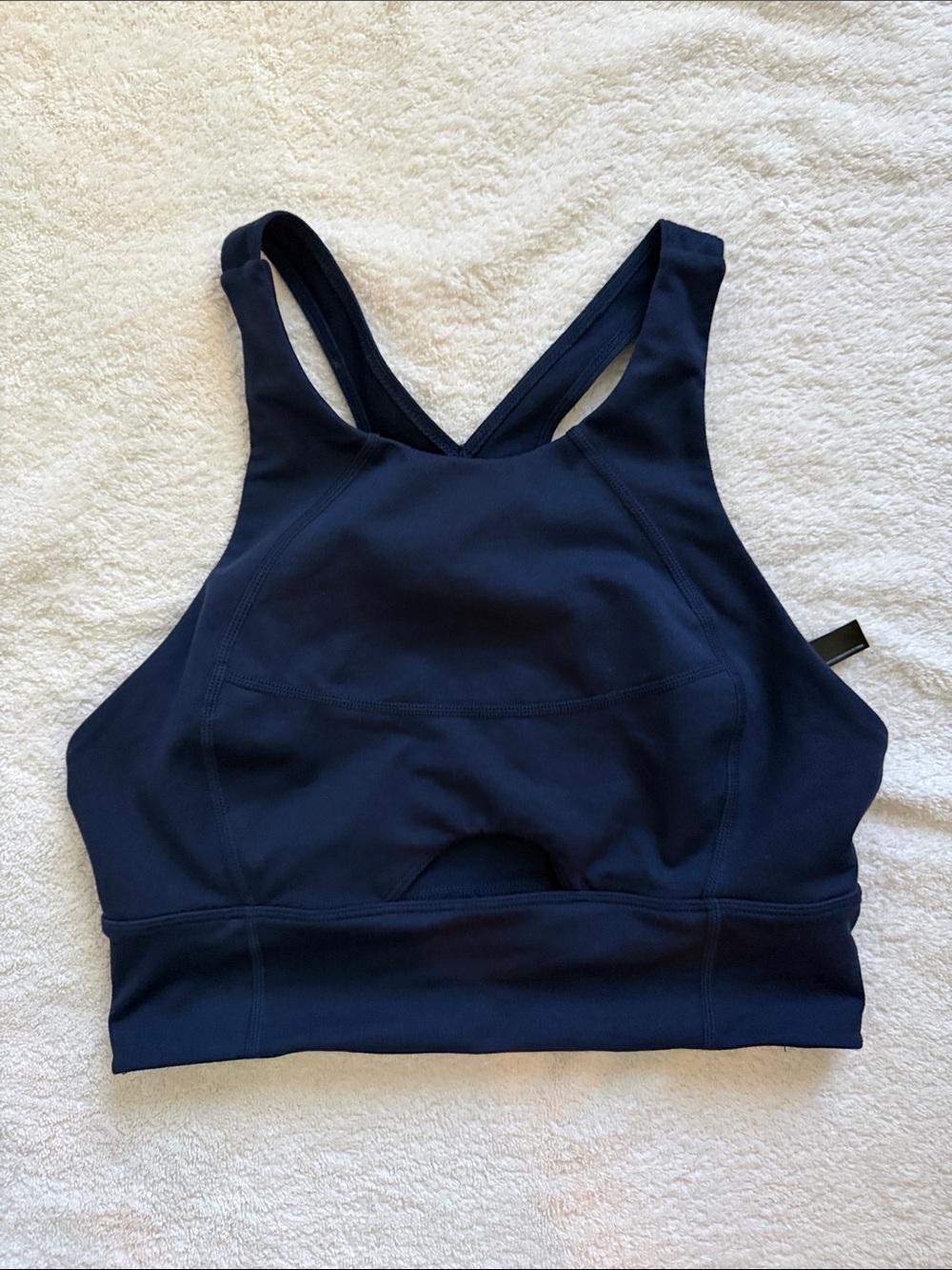 Free People Navy High-Neck Sports Bra with Keyhole feature and phone pocket